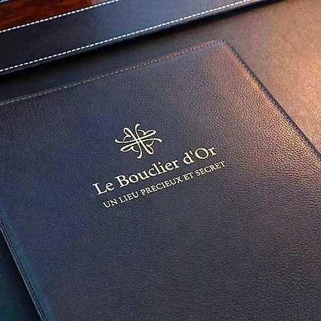 & Le Bouclier D'or